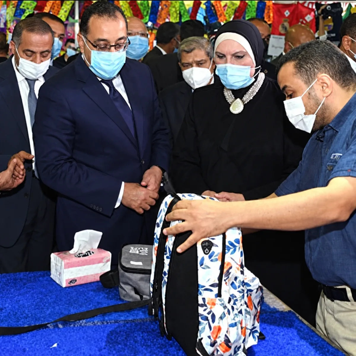 Hajj Yasser, Elite's founder, presenting Elite bags to Egypt's Prime Minister.